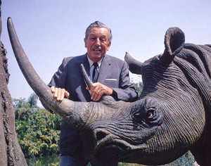 Publicity still of Walt Disney and a rhinoceros in the Jungle Cruise at Disneyland Park