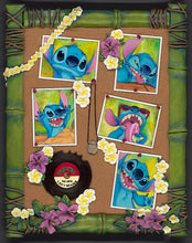 Load image into Gallery viewer, Stitch makes goofy faces in five snapshots pinned to a corkboard with plumeria flowers, a bamboo frame and an Ohana record.