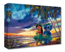 Load image into Gallery viewer, Lilo and Stitch dance the hula in matching green grass skirts and leaf crowns on a palm-lined beach at colorful sunset.