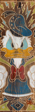 Load image into Gallery viewer, Angry Donald Duck glares in his blue sailor hat and red bow tie, with fists raised, on a wood-grain carved background.