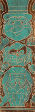 Load image into Gallery viewer, The Hitchhiking Ghosts Phineas, Ezra and Gus stack in teal, carved into rich brown wood grain with thumbs out.