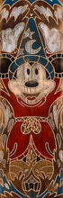 Load image into Gallery viewer, Sorcerer Mickey Mouse in his starry blue hat and red robe raises his arms, carved in wood-grain style with ornate patterns.