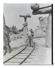 Load image into Gallery viewer, &quot;Walt Walking on the Tracks of Rainbow Caverns Mine Train&quot; from Disney Photo Archives