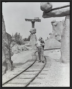 "Walt Walking on the Tracks of Rainbow Caverns Mine Train" from Disney Photo Archives