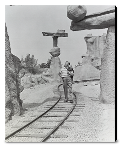 "Walt Walking on the Tracks of Rainbow Caverns Mine Train" from Disney Photo Archives